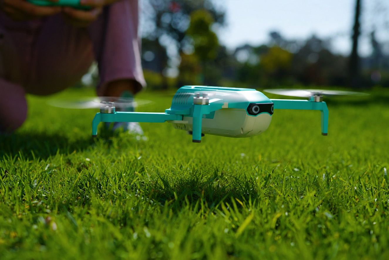 HS320 bubble drone hovering above grass